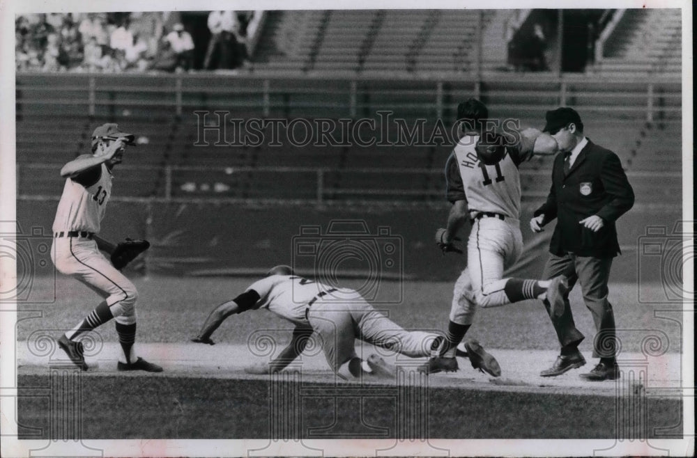 1968 Stanley Dives For Bag As Morton Pursues With Ball  - Historic Images