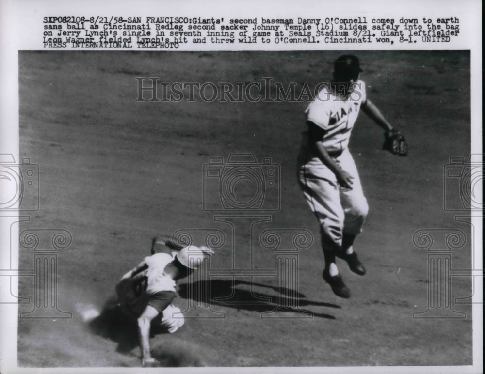 1958 Press Photo Danny O&#39;Connell, Reds&#39; Johnny Temple slides safely - nea41009 - Historic Images