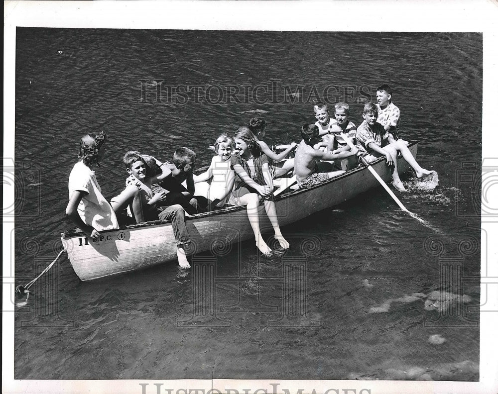 1953 Press Photo View Of Twelve Passengers On Boat In Water - nea42288 - Historic Images