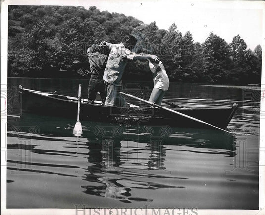 1952 Press Photo View Of People Changing Places In Boat On Water - nea42300-Historic Images