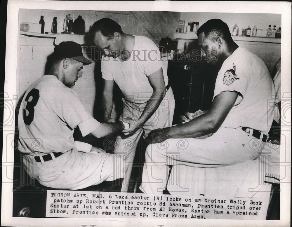 1951 Trainer Patching Up Indians' Robert Prentice at Practice - Historic Images