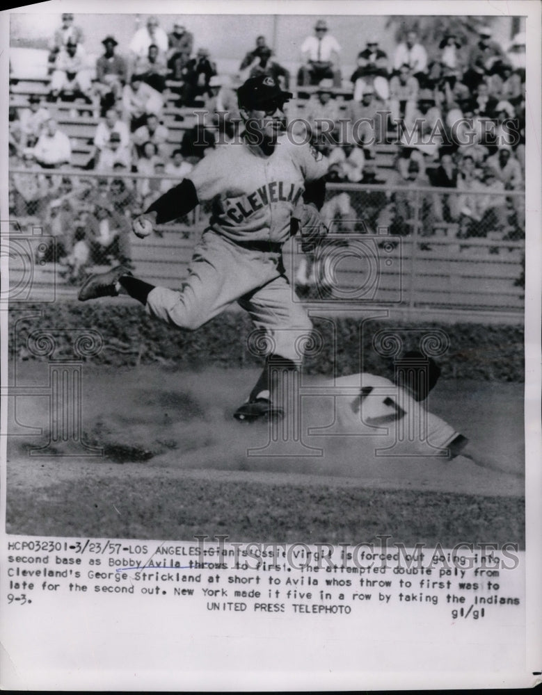 1957 Cleveland Indians&#39; Bobby Avila throwing to first vs NY Giants - Historic Images