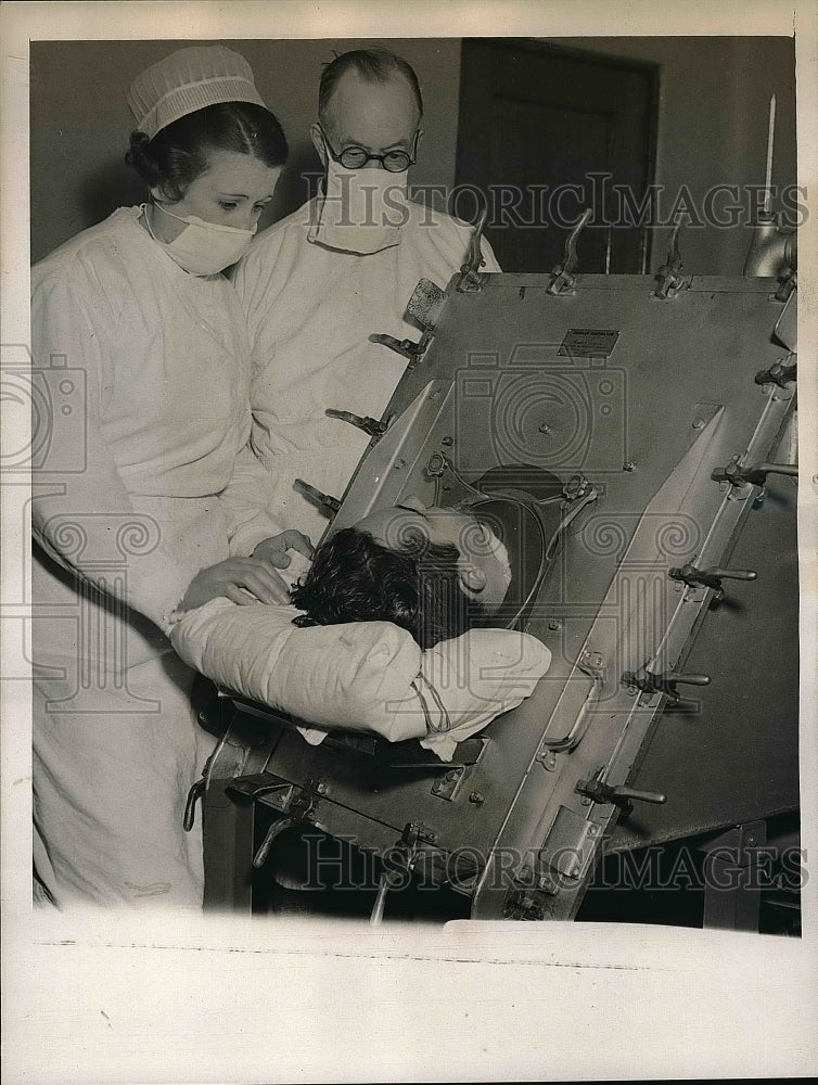 1937 Press Photo James Helmer In Respirator, Father P. A. Helmer &amp; Nurse - Historic Images