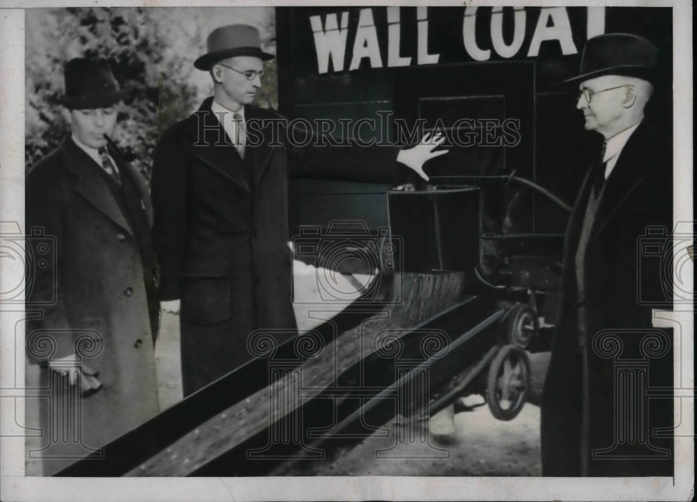1938 Press Photo Coal Dealer Demonstrates Invention Noiseless Dustless Truck - Historic Images