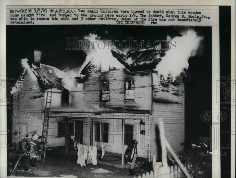1961 Press Photo Firemen Battle Fire At Home Where Two Children Died - Historic Images