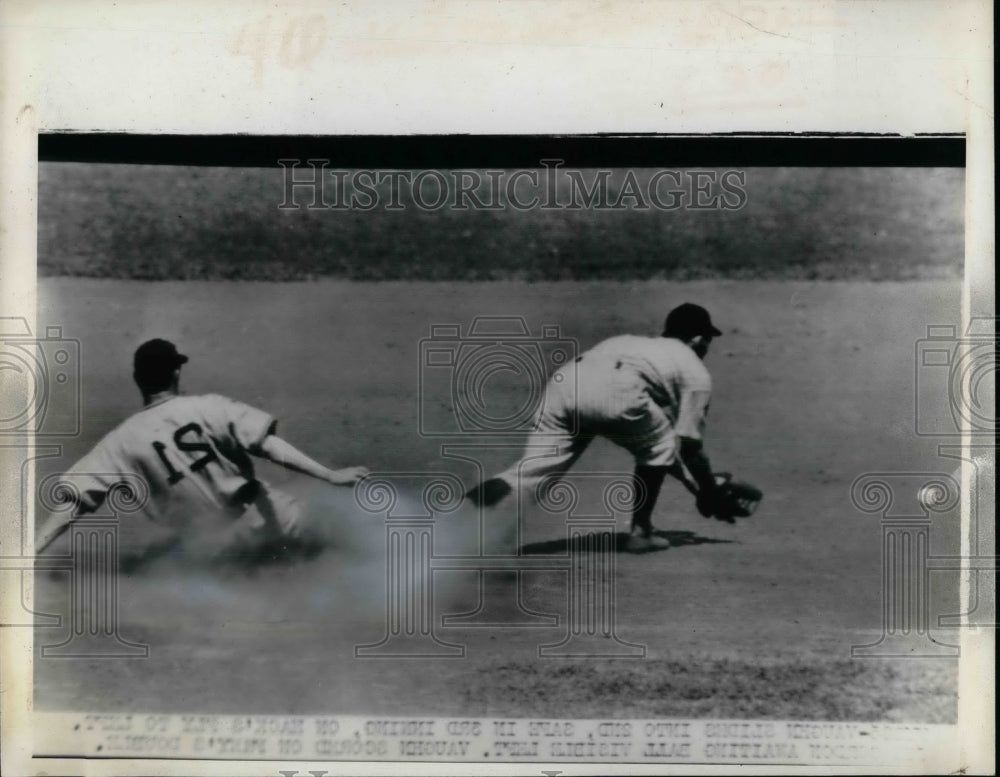 1939 Two baseball players in action - Historic Images