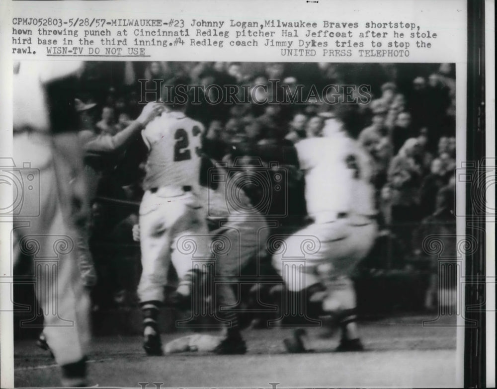 1957 Press Photo Braves Johnny Logan vs Reds Hal Jeffcoat-Historic Images