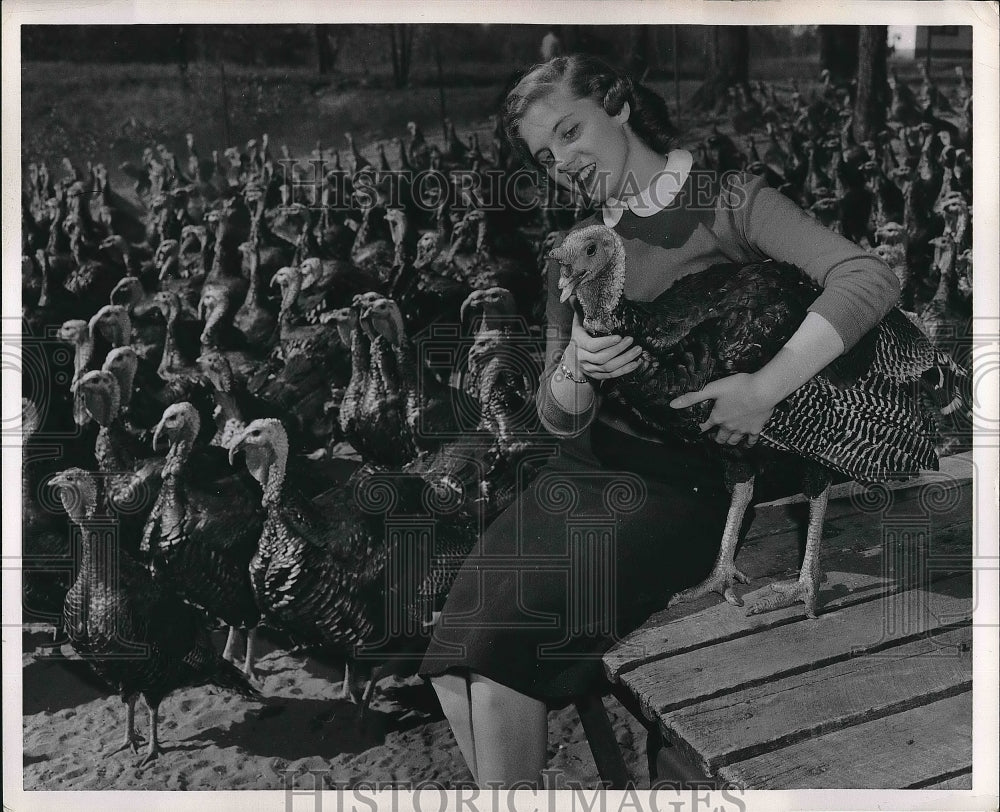 1956 Paige Phelps at turkey farm near Albany NY - Historic Images
