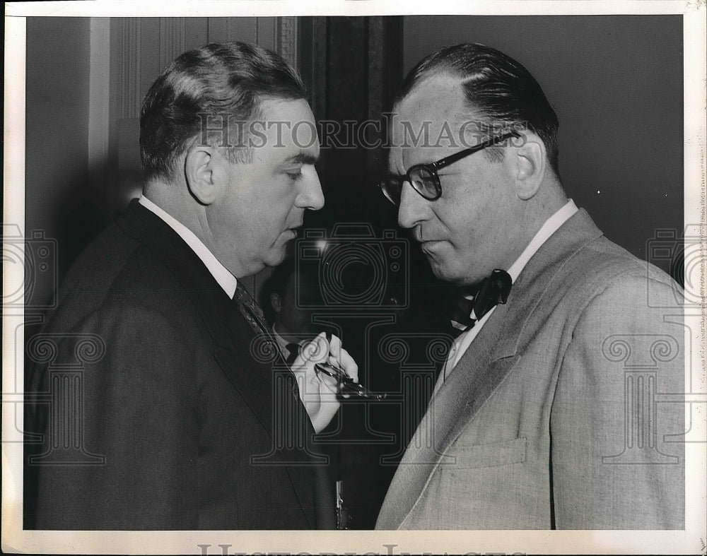 1951 Gordon Dean speaking with a reporter. - Historic Images