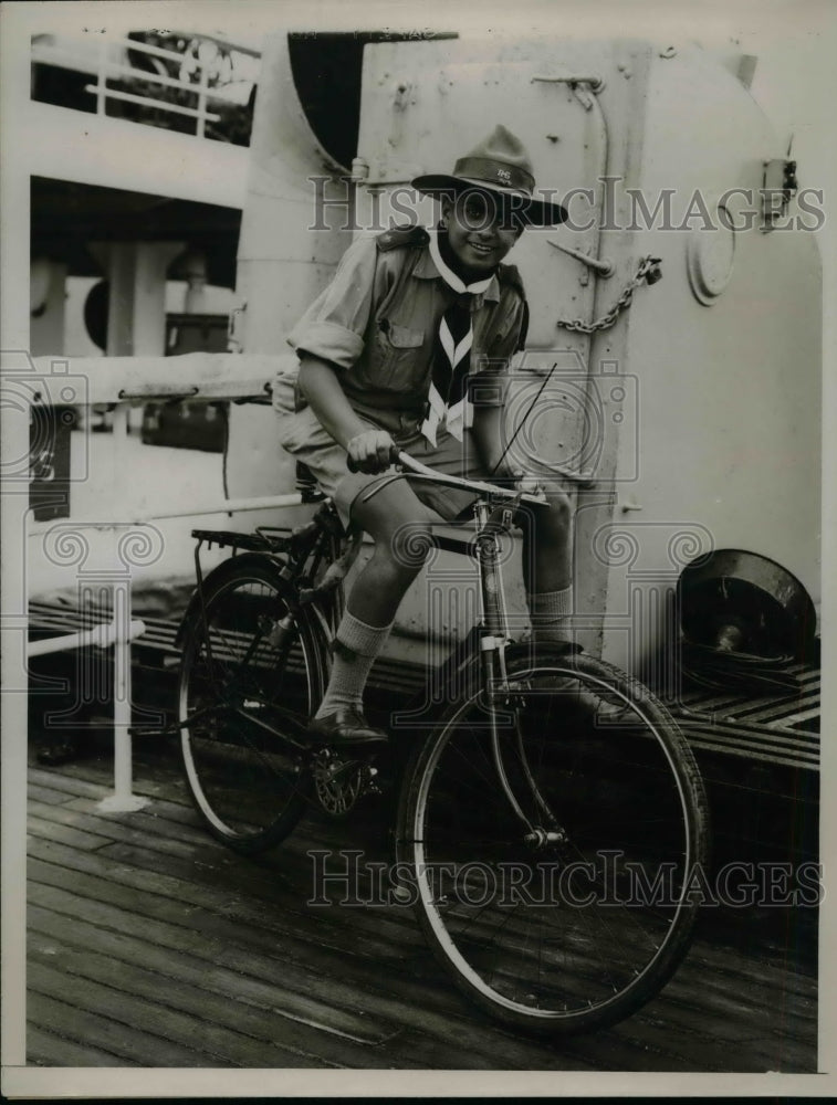 1935 Press Photo Jimmy Rustowgi biking. - nea49383-Historic Images