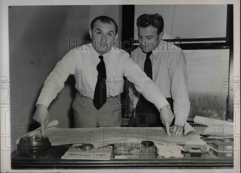 1938 Captain Alfred Henke and Alfred Boyer planning voyage - Historic Images