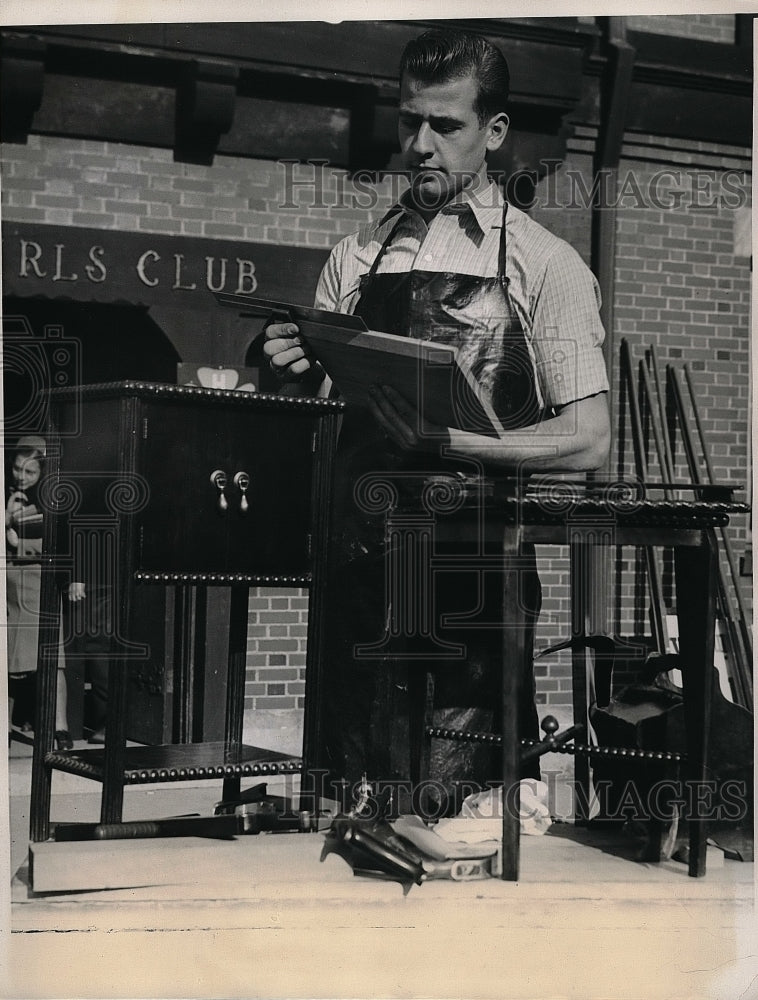 1938 Jerry Hackett with furniture he handcrafted  - Historic Images