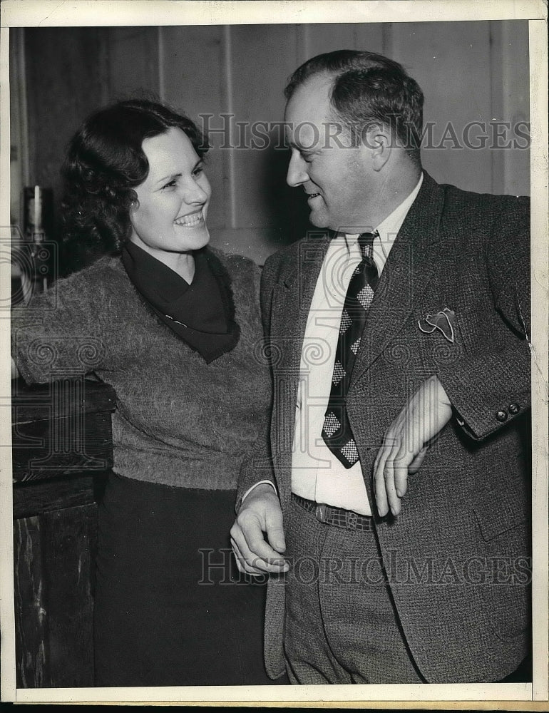 1937 Roy Ruddle and his wife after being questioned by police - Historic Images