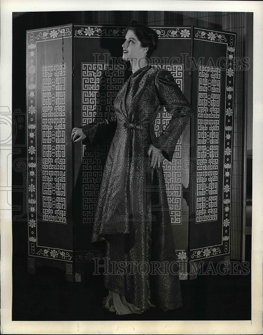 1941 Model showing of lacquer red parchment taffeta  - Historic Images