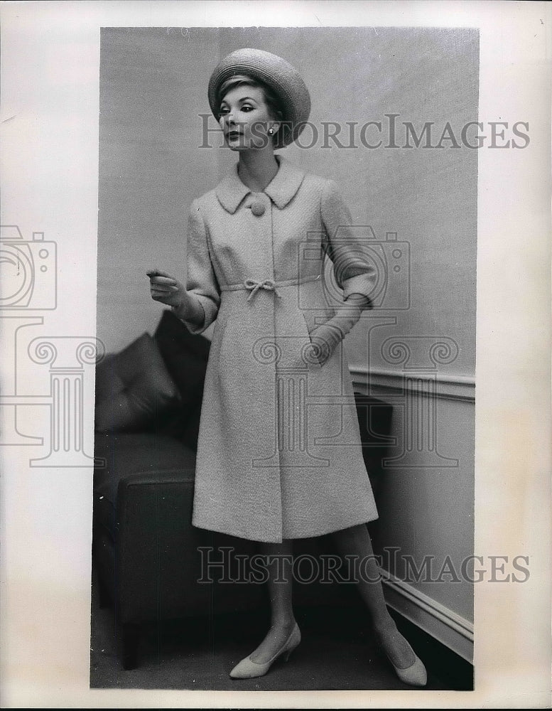 1958 Press Photo Model showing off yellow wool spring coat - nea50747 - Historic Images