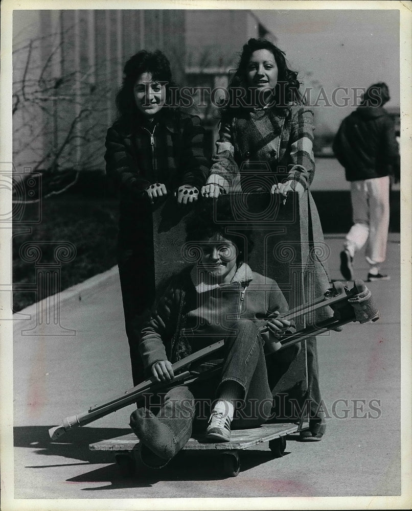 Press Photo Injured Cindy Millen Pushed In Cart By Classmates At Bowling Green - Historic Images