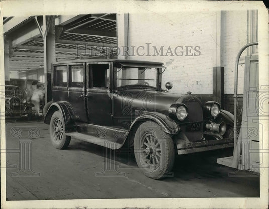 1934 Squad Cat parked for repairs.  - Historic Images
