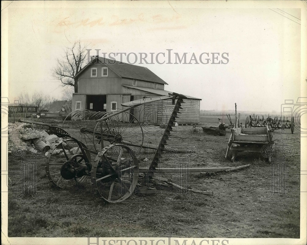 1946 Press Photo Old farm implements sitting outdoors rusting - nea51644 - Historic Images