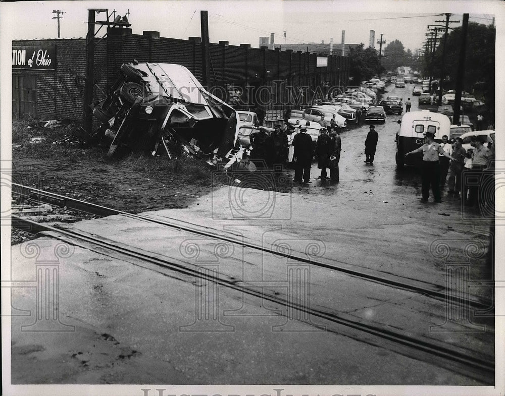 1955 Press Photo A car wreck near a train track. - nea51721 - Historic Images