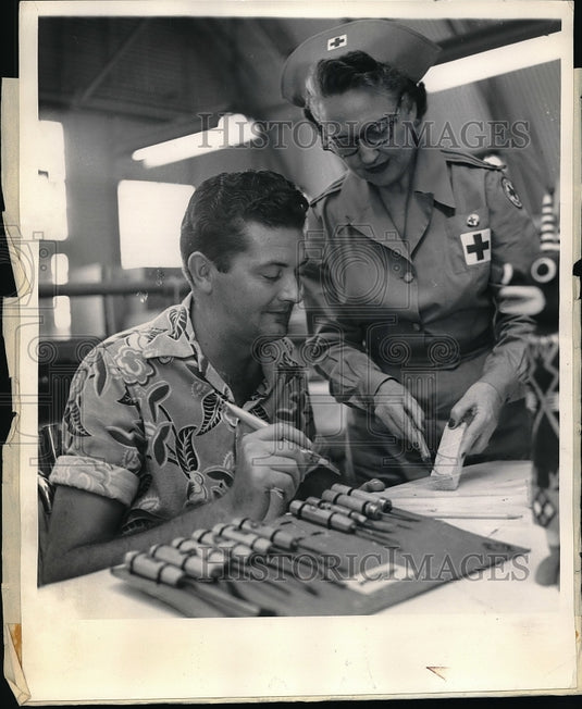 1956 Press Photo Red Cross Volunteer working with Veteran at V.A. Hospital - Historic Images