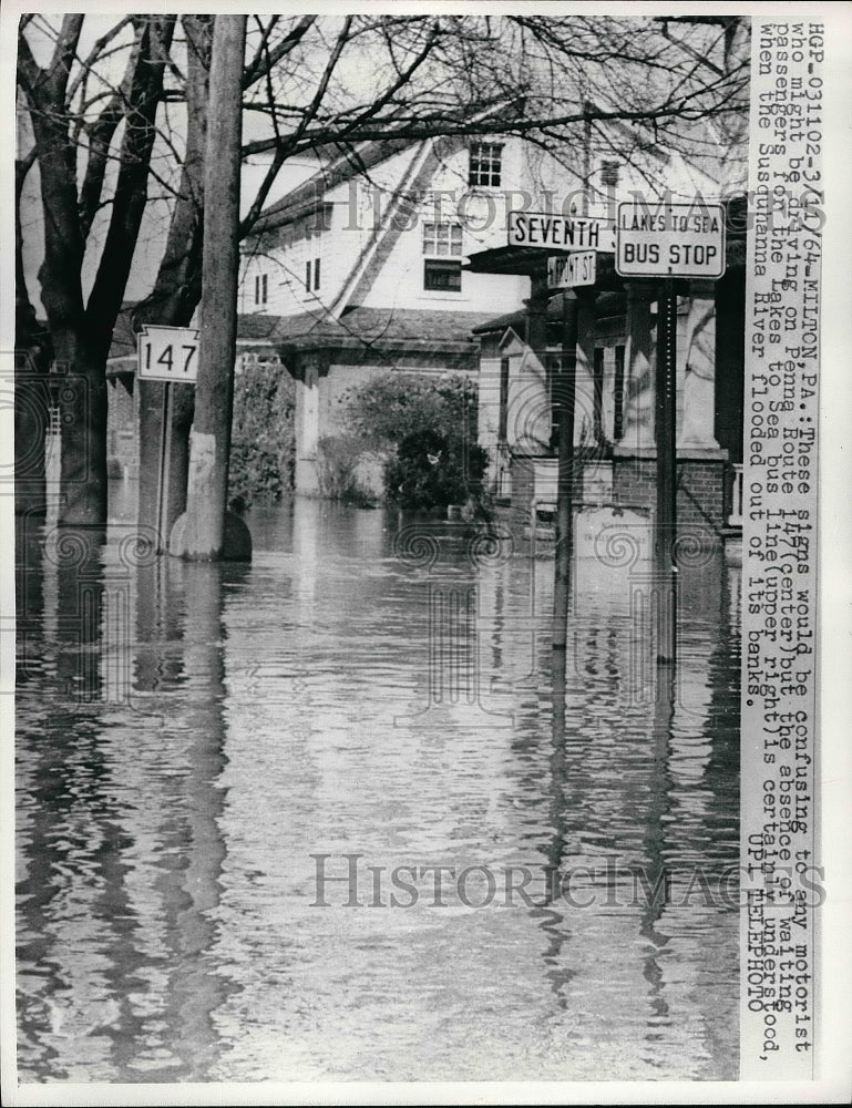1964 Press Photo Signs for the Lakes to Sea Bus line after Flood - nea52014 - Historic Images