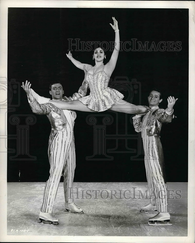 1957 B Specht, C Machals,R Robertson performing in the Ice Capades - Historic Images
