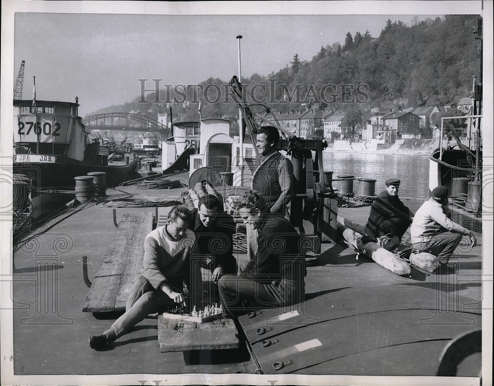 1959 Passau Germany Boatmen wait for ships  - Historic Images