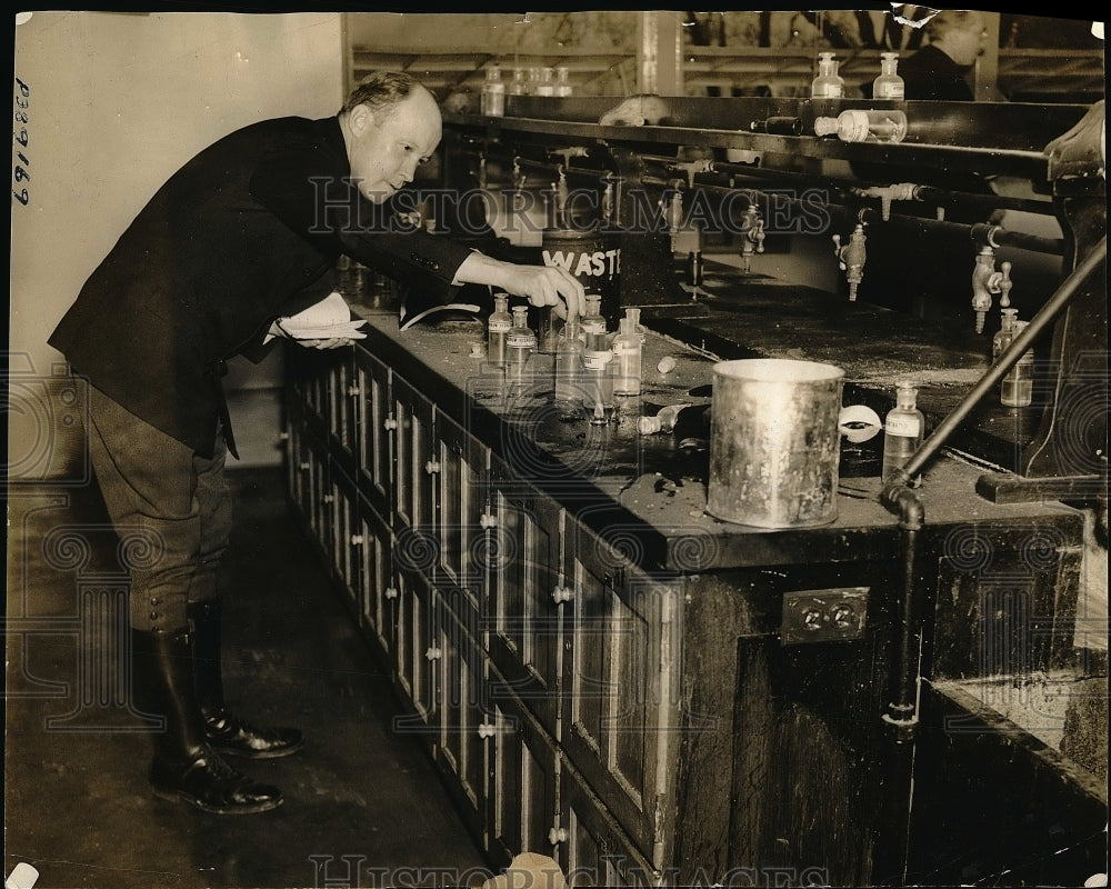 1937 Captain R. A. Howard Examines Equipment After Explosion - Historic Images