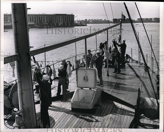 1952 Garaventa Crew Hangs Weekly Wash Out To Dry On Fore - Historic Images