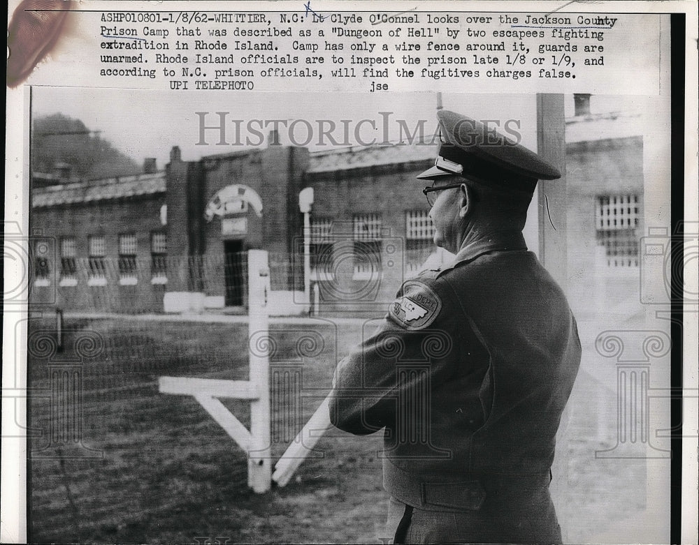 1962 Lt. Clyde O&#39;Connel Looking Over Jackson County Prison Camp - Historic Images