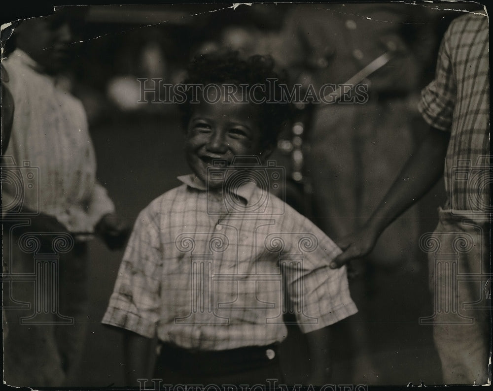 1920 of a smiling Hawaiian boy  - Historic Images