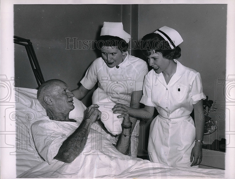 1963 Coach Paddy Driscol with nurses Mary Daly and Nancy Koeppe - Historic Images