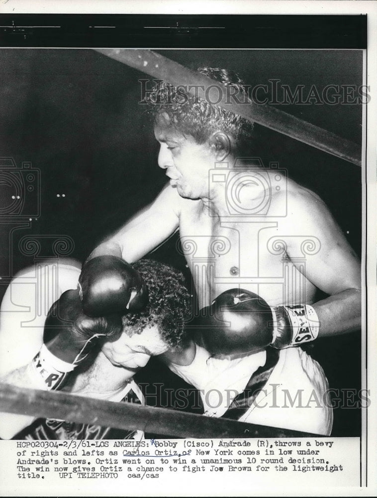 1961 Boxer Bobby Andrade and Carlos Ortiz In boxing match - Historic Images
