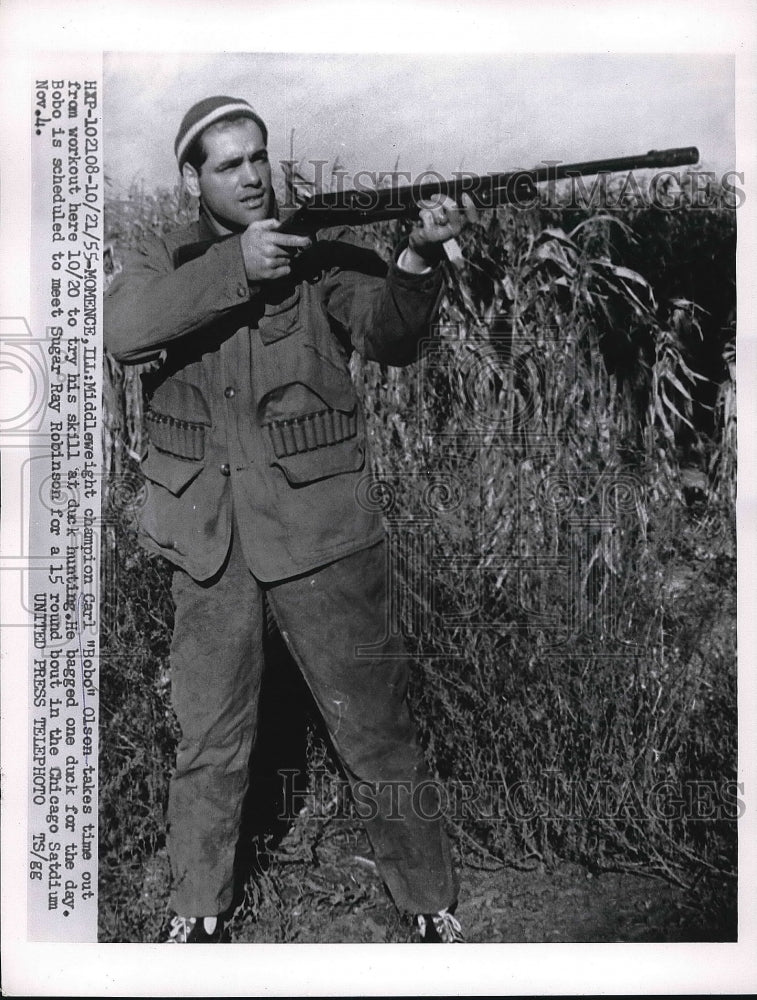 1955 middleweight champion Carl Olson duckhunting  - Historic Images
