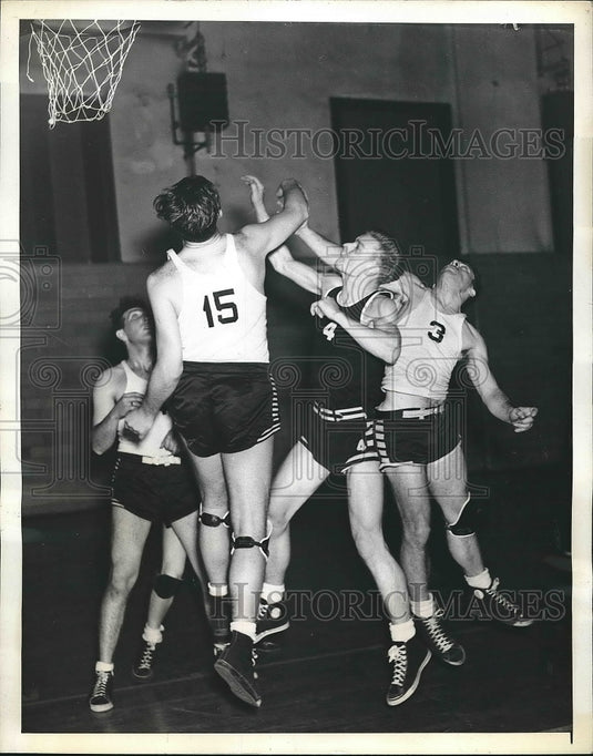 1943 George Senesky of St. Joseph College vs Newark U.'s Joe Caskey - Historic Images