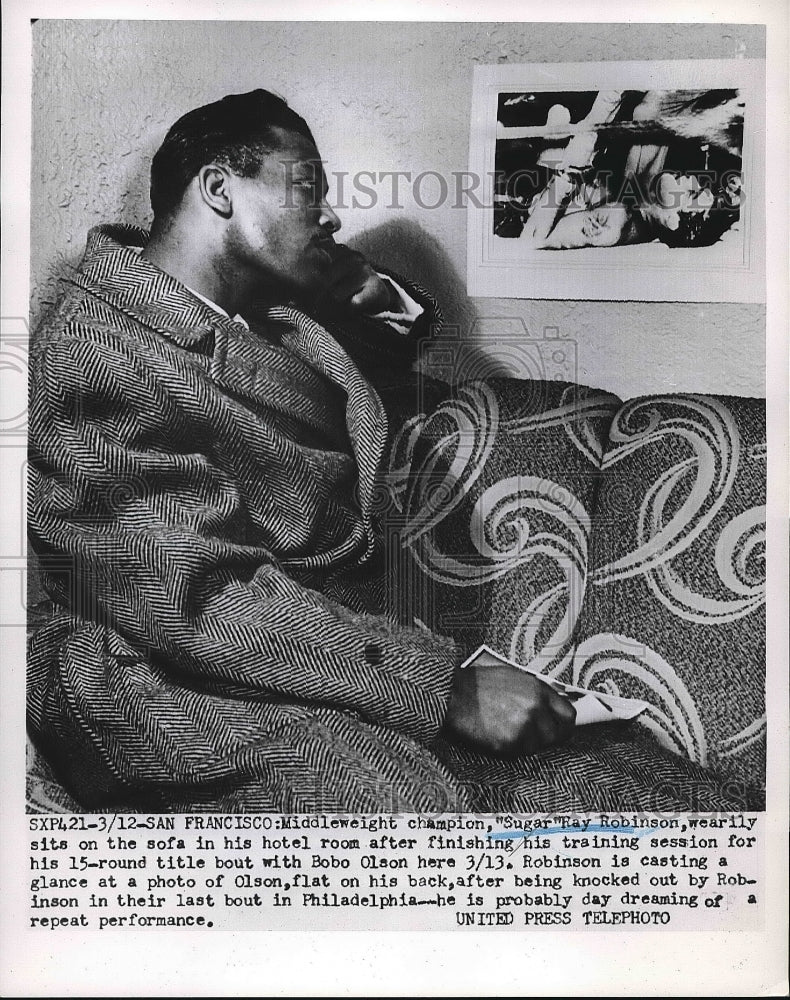 1952 Press Photo Boxer Sugar Ray Robinson in Deep Thought on Sofa - Historic Images