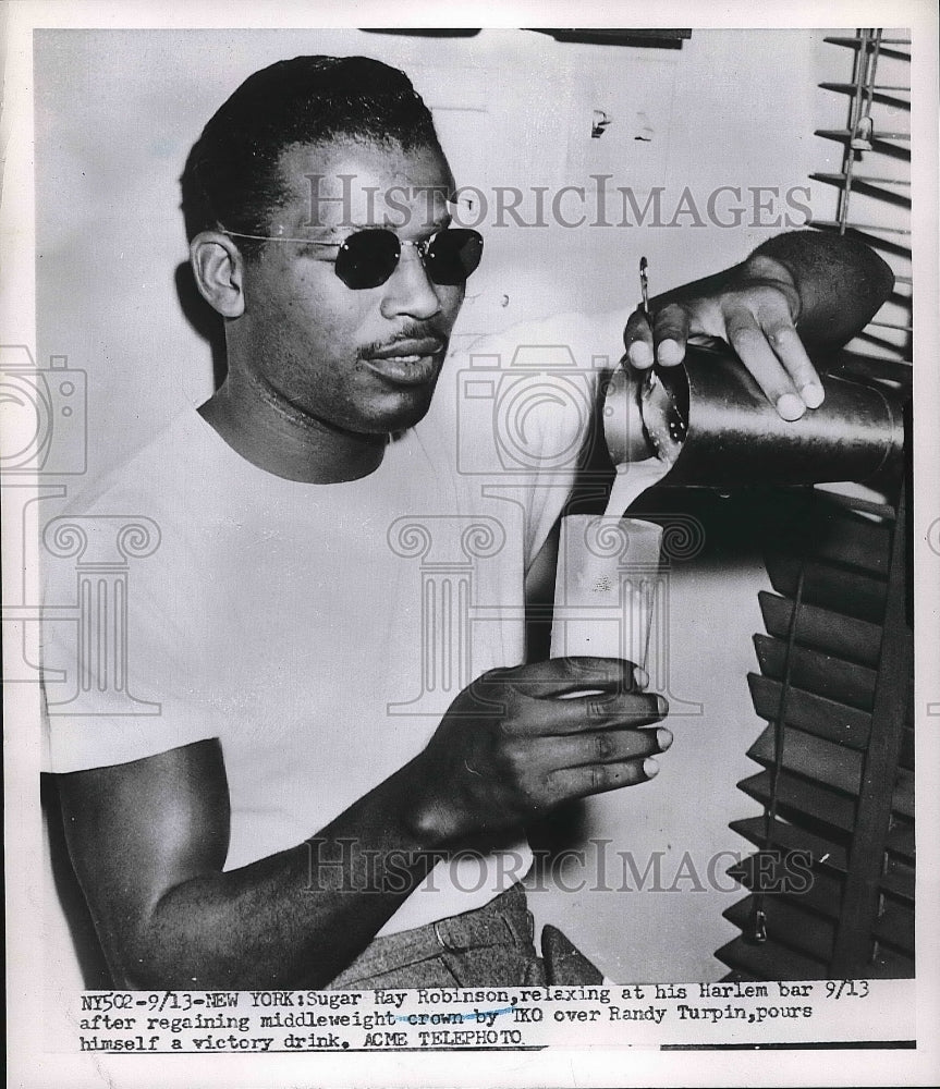 1951 Press Photo Boxer Sugar Ray Robinson Pouring Health Drink - nea55405 - Historic Images