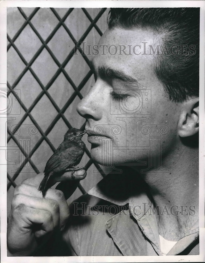 1956 Press Photo Ken Doyle San Francisco Mechanic Helps Bird - nea55482 - Historic Images