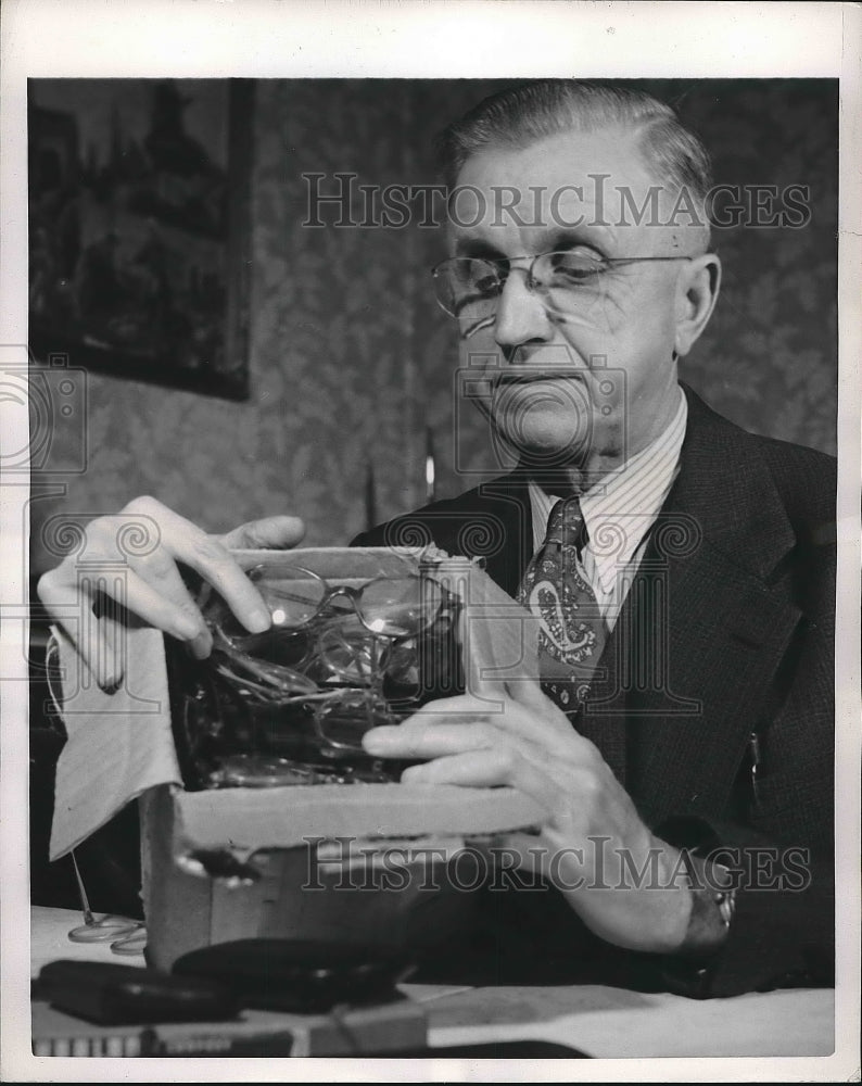 1952 Electrician Foreman Clyde Lewis Packs Discarded Eyeglasses - Historic Images