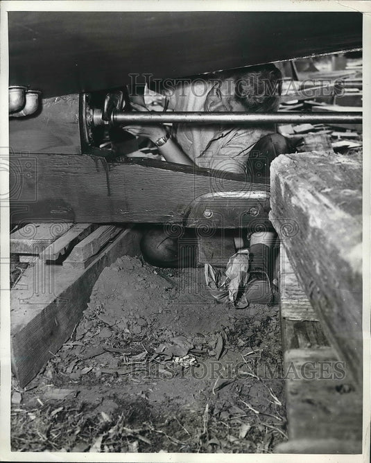 1951 Ginger using a Stillson wrench to finish boat  - Historic Images