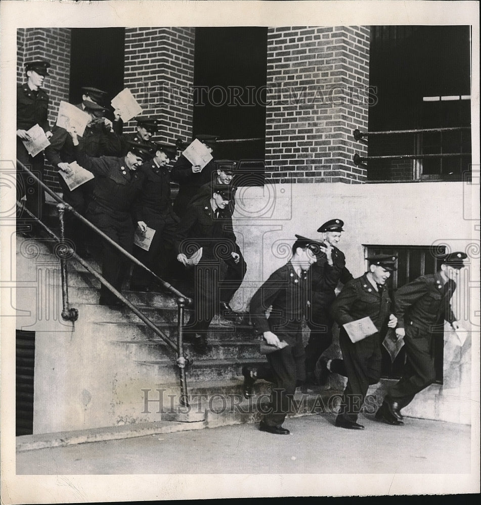 1949 Men inducted under the draft with their discharge papers - Historic Images