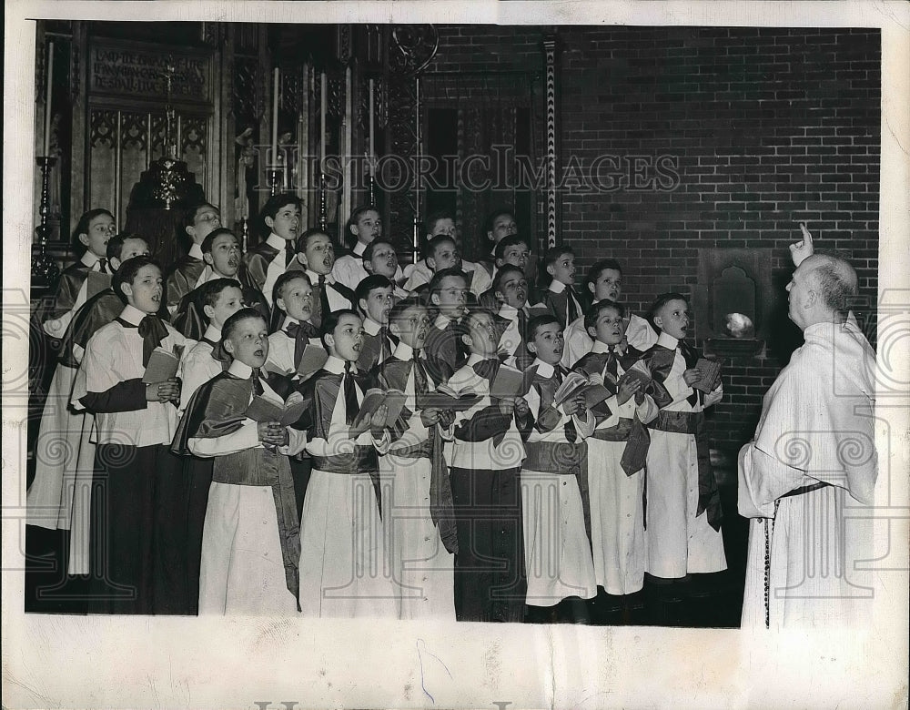1944 Assistant Pastor Justin Costello directing choir  - Historic Images