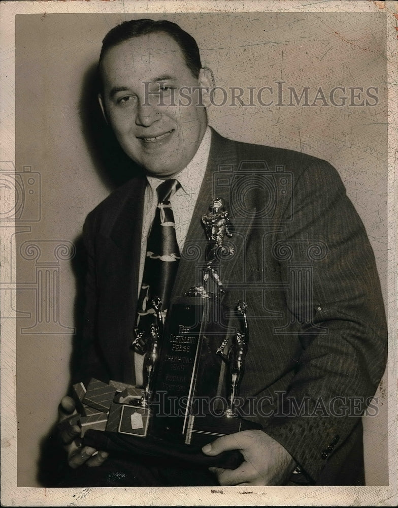 1949 John Nagy holding a press trophy  - Historic Images