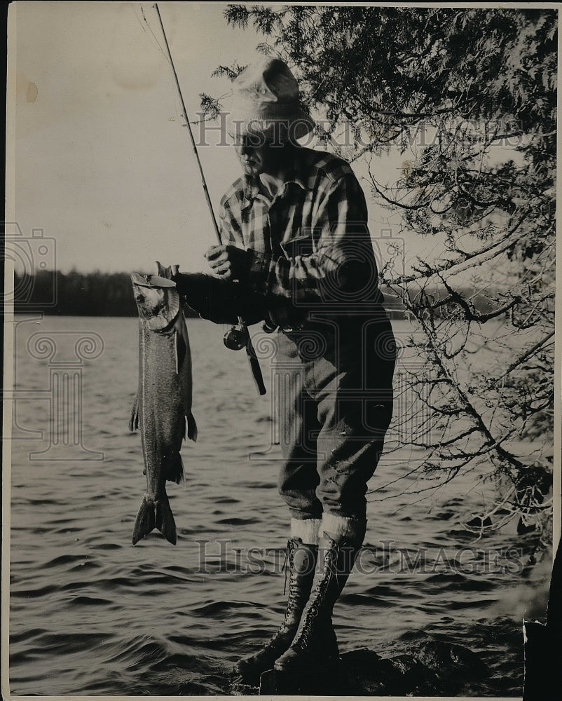 1933 Press Photo Mike Ament with salmon trout - nea56223 - Historic Images