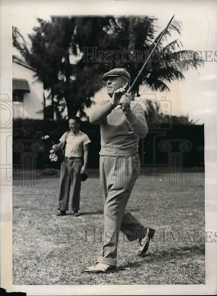 1938 Frank Hauge and James Farley playing a round of golf - Historic Images