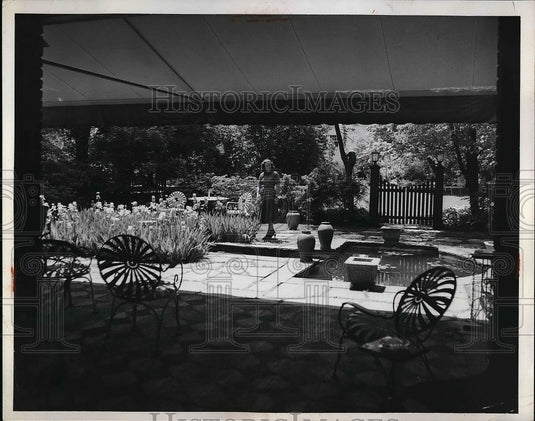 1953 Mrs. Lee Shumacher at the home of John Barry.  - Historic Images