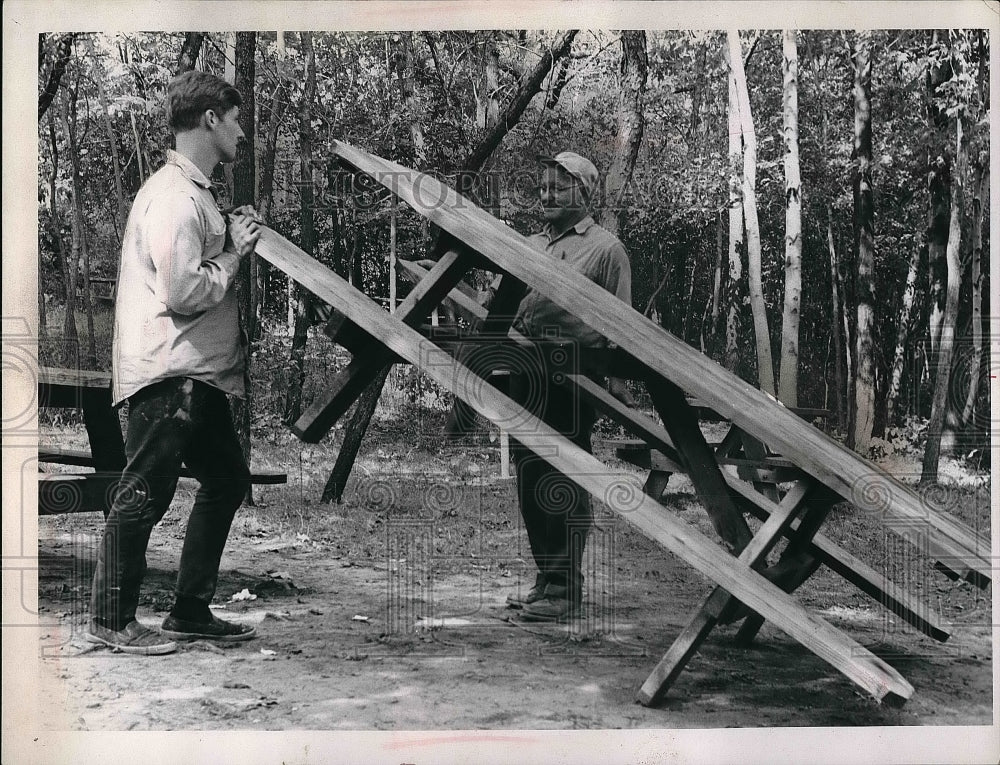 Den Jokes and August Hrifor working on park benches.  - Historic Images