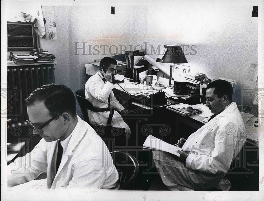 1966 Press Photo Staff Sitting In Office Of L &amp; C Hospital - nea56503 - Historic Images
