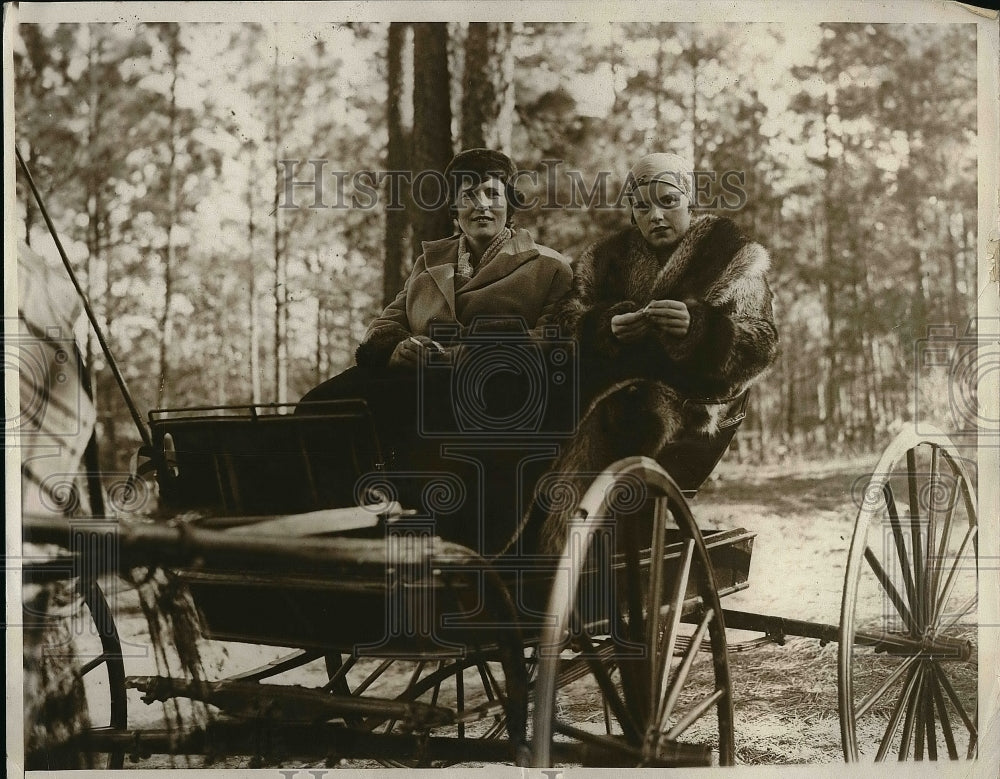 1932 Ms. Helen Potter riding in a carriage  - Historic Images