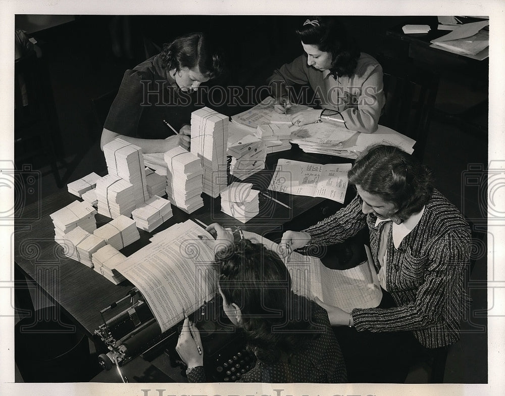 1941 Women looking over papers for musical program  - Historic Images